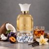 Lattafa Petra Eau de Parfum 5 Lattafa Petra Eau de Parfum szilva, rum, krémes kókusz, tubarózsa, vanília és praliné gourmand illatjegyekkel.